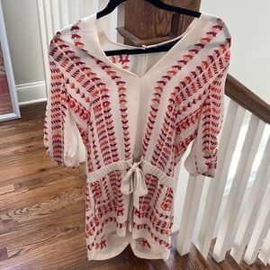 BCBG romper with pockets and 3/4 sleeves. Size small. Worn twice